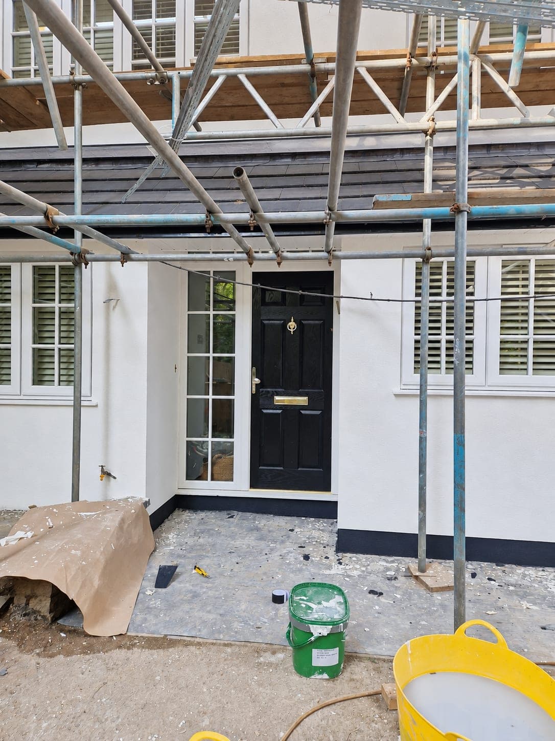Rendered front elevation with the scaffold still up, Enfield EN3