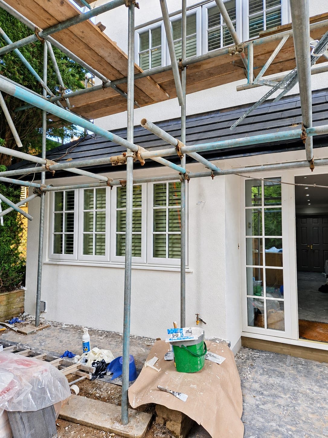 Side and rear elevations finished in white render, Enfield EN3