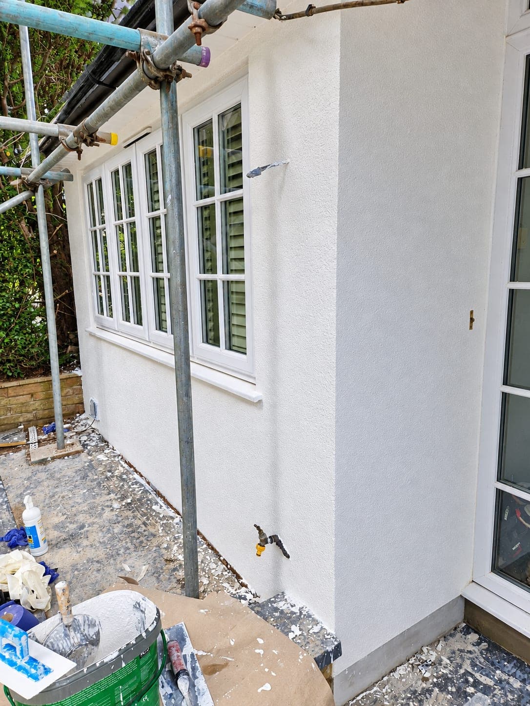 Side elevation rendered, scaffold being struck, Enfield EN3