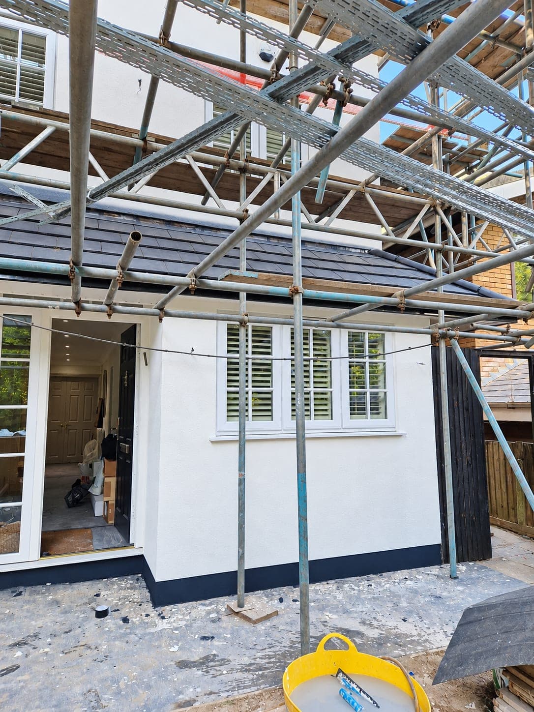 Rear elevation with render and plinth finished, Enfield EN3