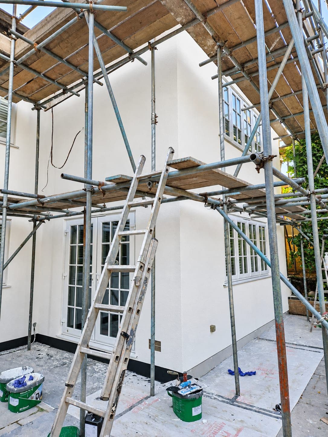 The same rear elevation finished in white render, London