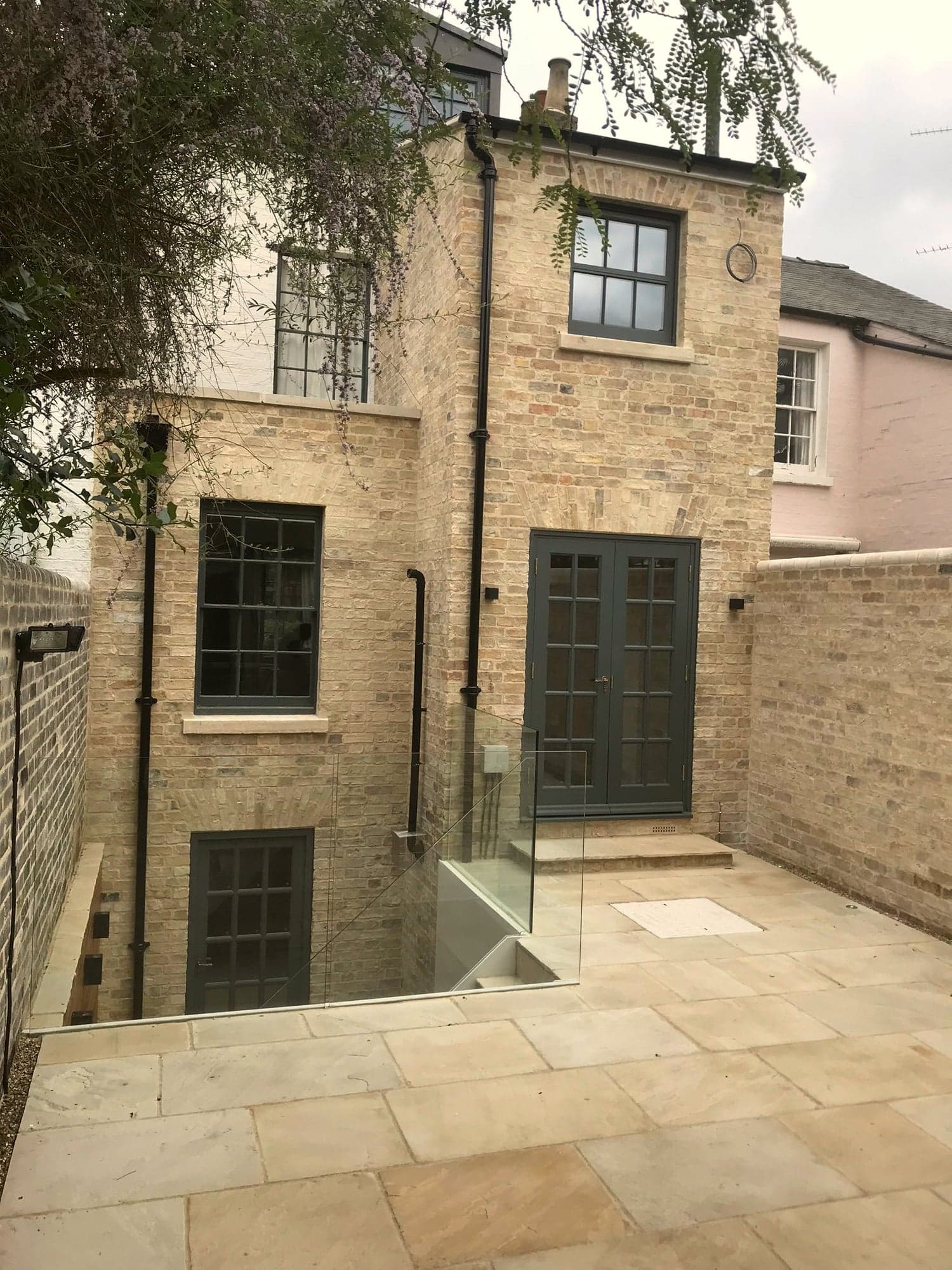 Yellow London stock brick extension, Kensington W8