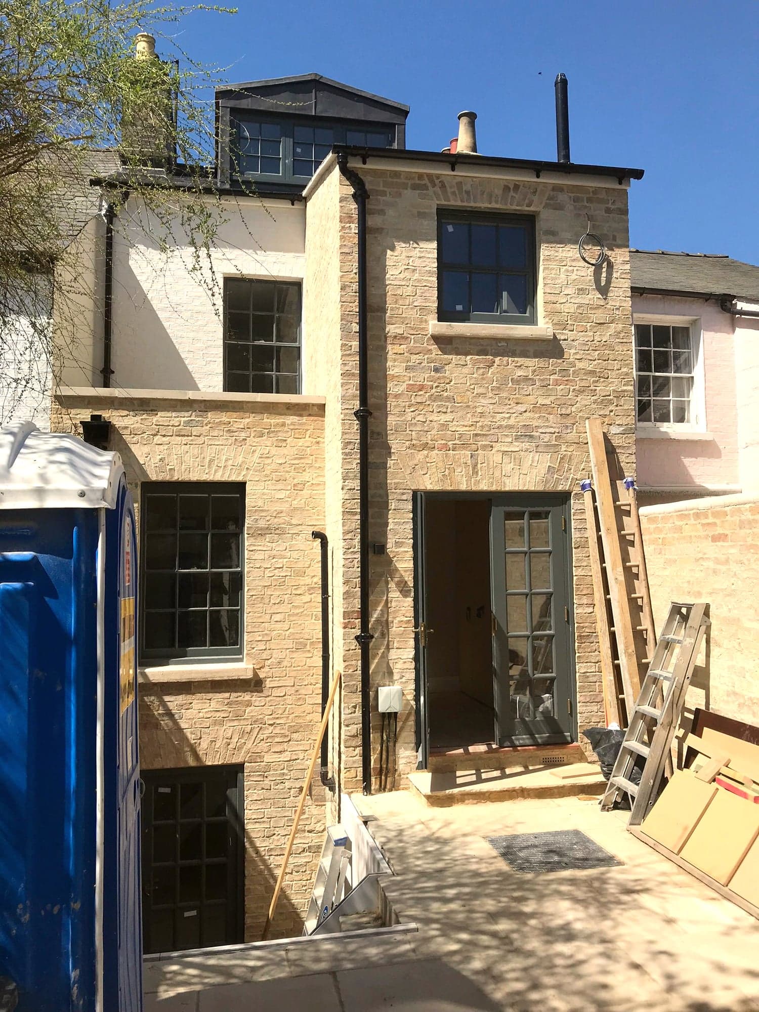 Rear of the property during the build, scaffold down and stonework finished, Kensington W8