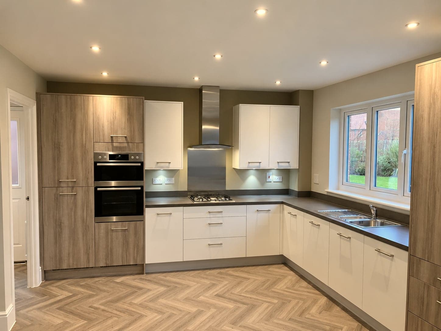 Two-tone white and woodgrain kitchen renovation, St Albans AL1