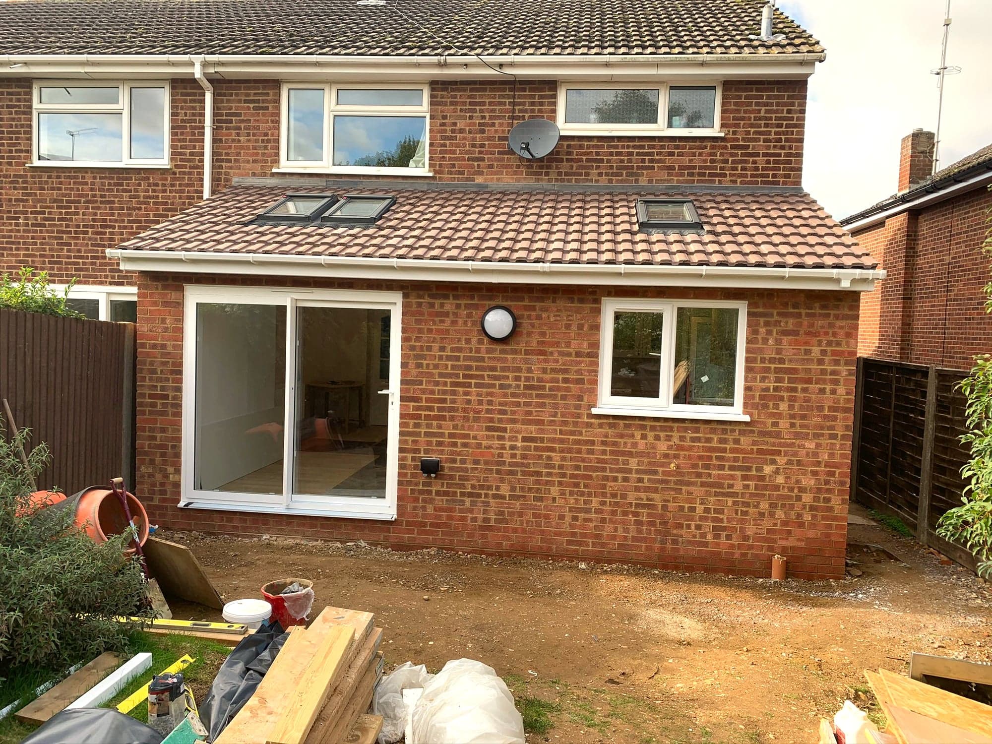Brickwork finished and glazing in, extension weathertight, Borehamwood WD6