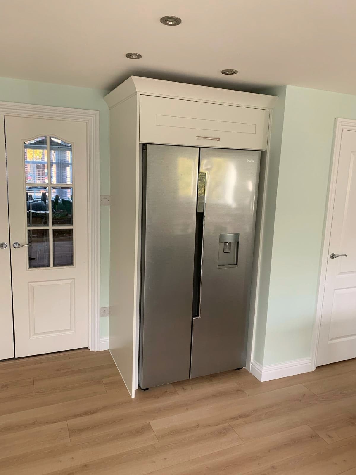 American fridge-freezer housed between the new door and the utility, Borehamwood WD6
