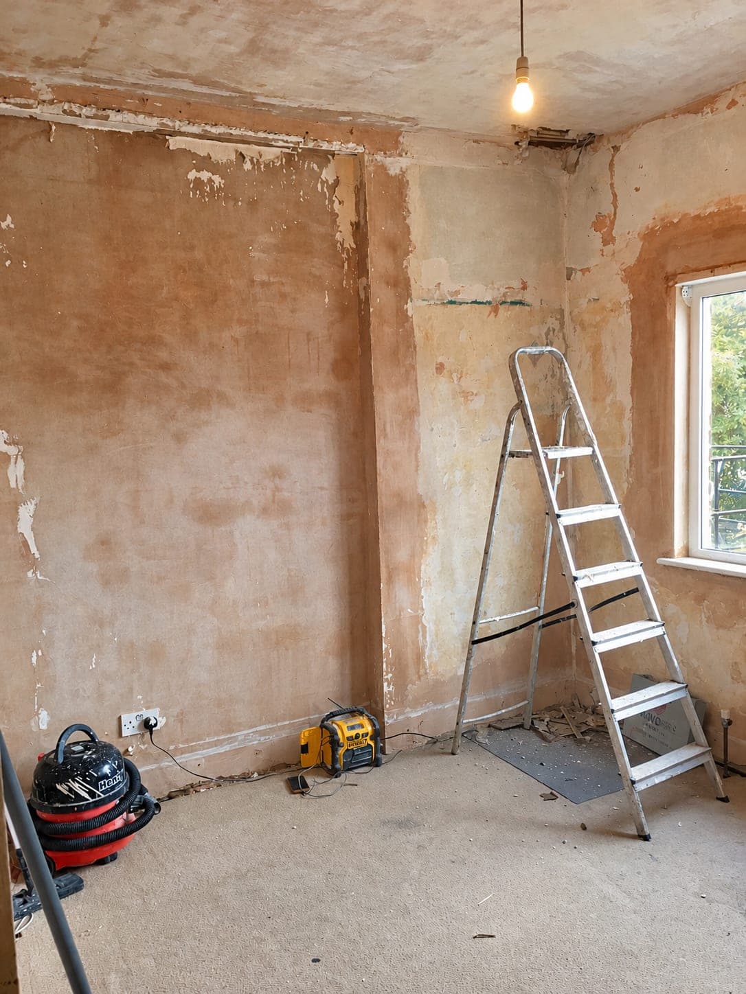 Room back to bare plaster with the old finishes removed, Winchmore Hill N21
