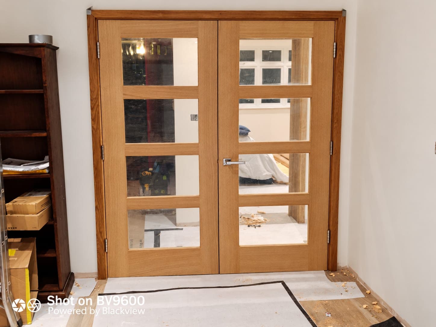 Glazed oak double doors hung and ready for ironmongery, London