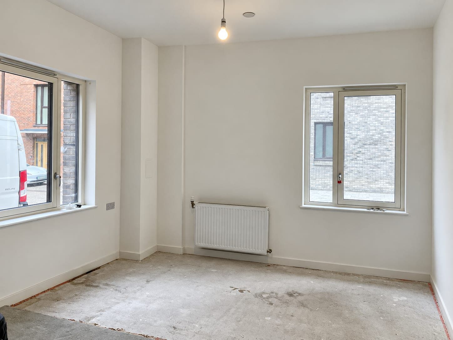Finished room with clean dry walls after damp treatment, London