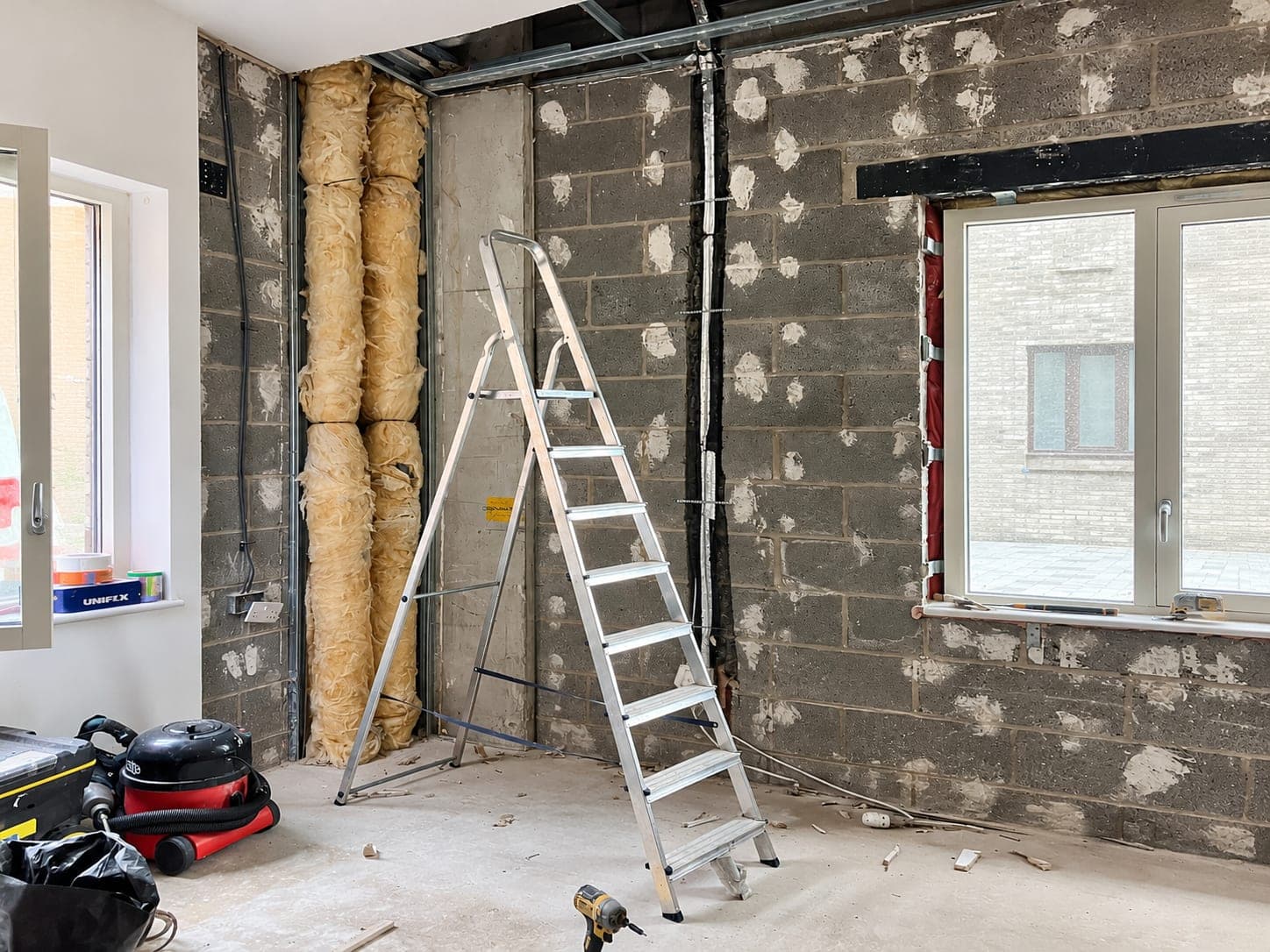 Insulation fitted behind a new wall lining, London