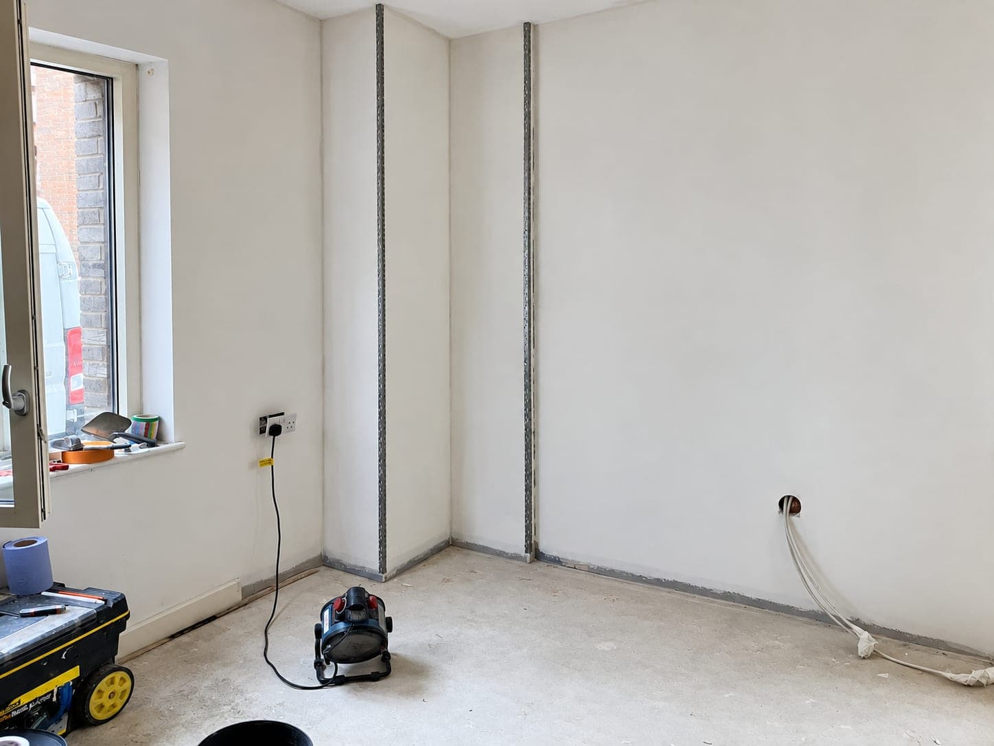 Finished corner with no sign of the previous damp, London