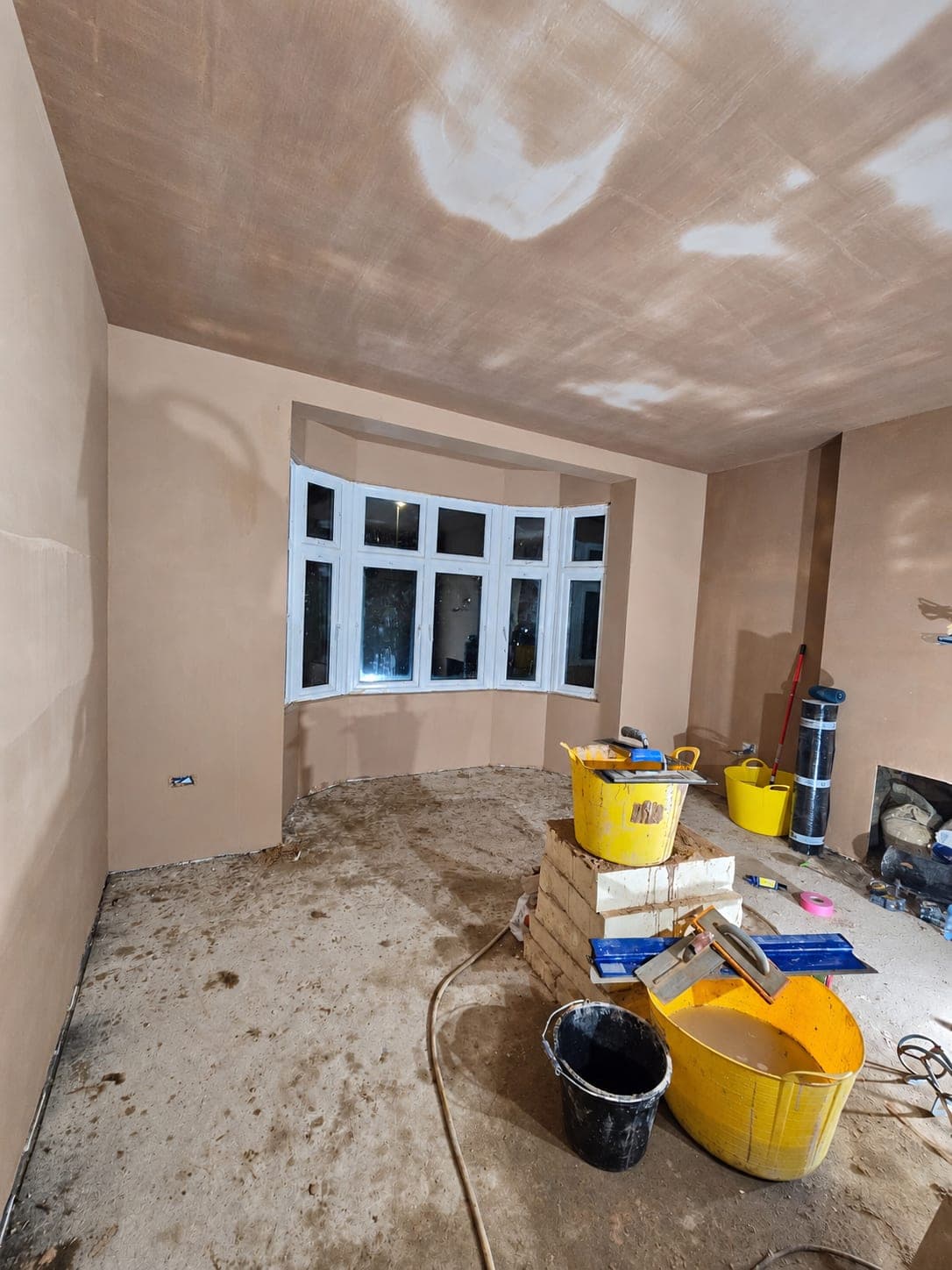 Bay window room skimmed and left ready to decorate, London
