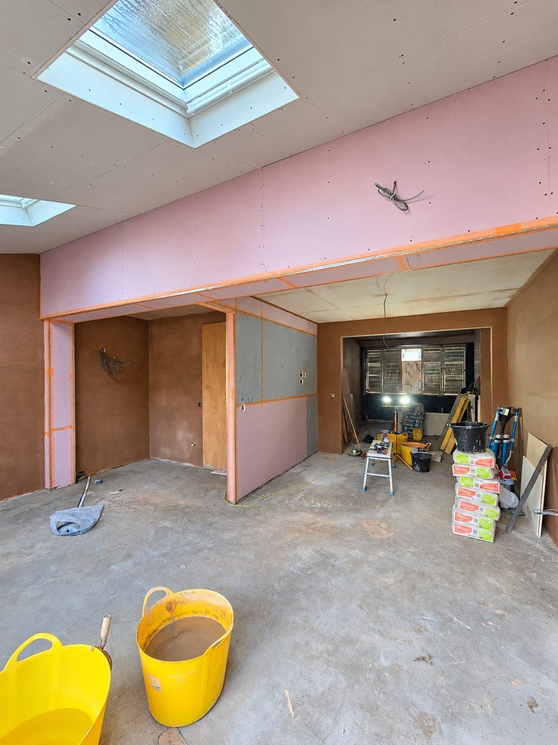 Corner and stop beads set out before plastering, London