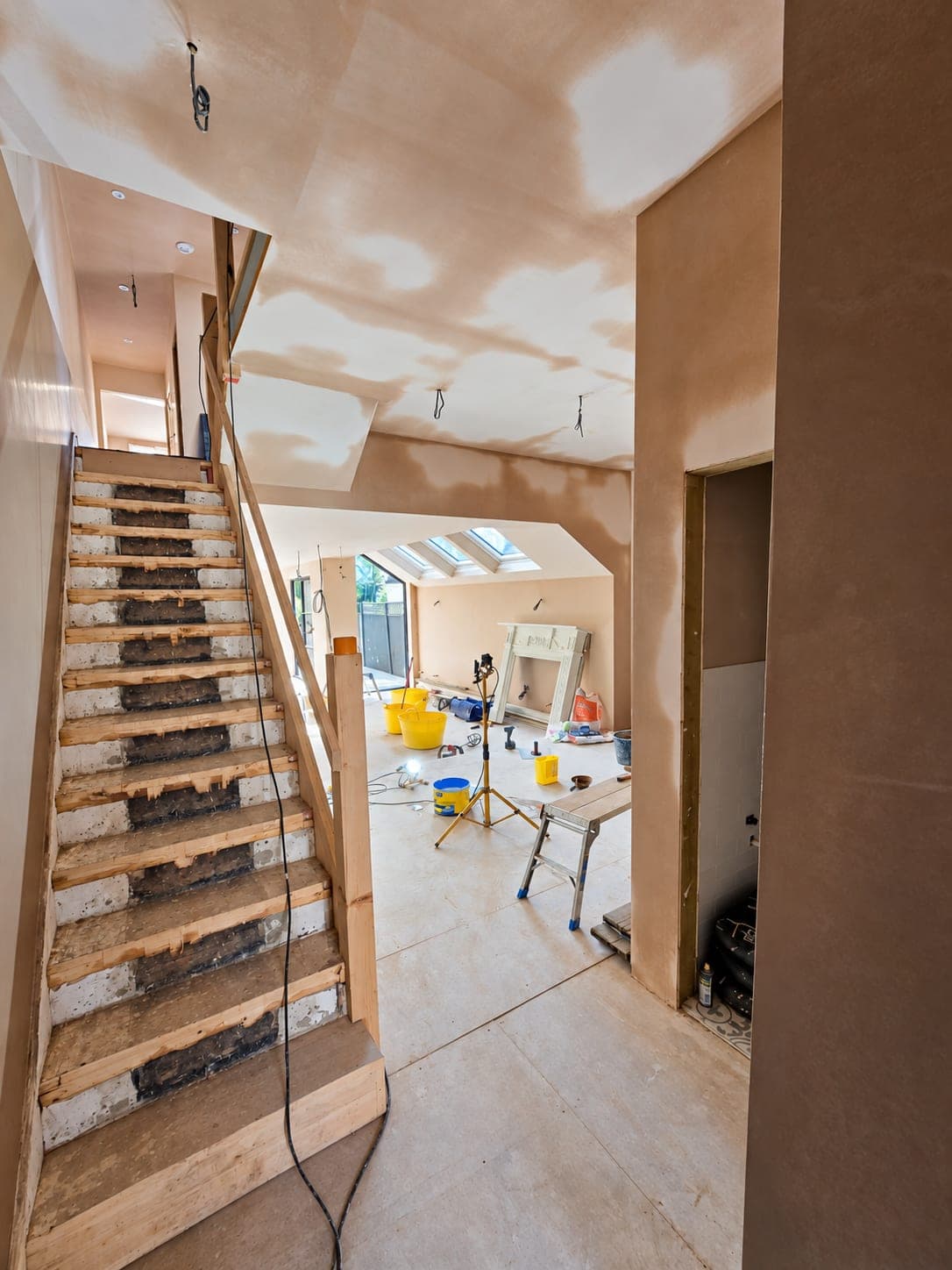 Hallway and staircase walls skimmed and finished, London
