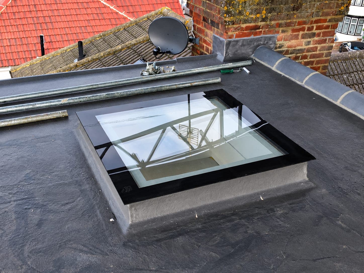Rooflight lantern bedded into a finished flat roof membrane, London