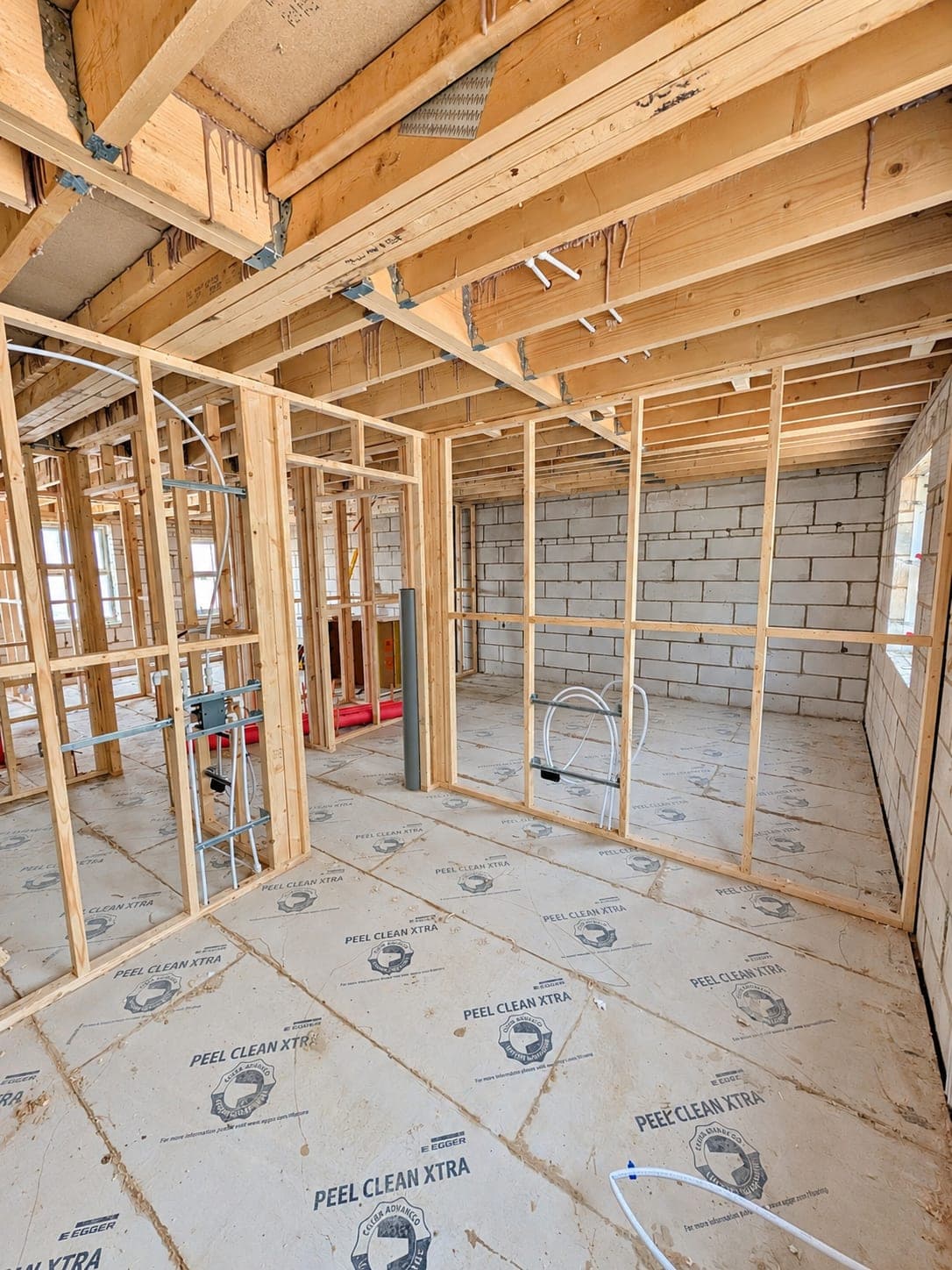 Stud framing taken up to the ceiling joists, London