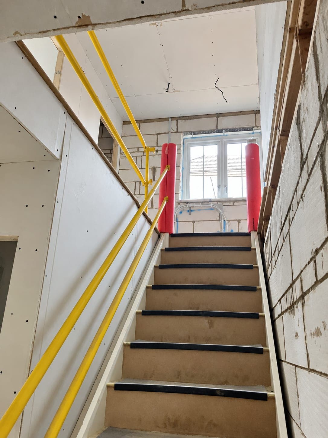Service runs taken up the stairwell partition, London
